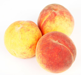 Full peach isolated on white background