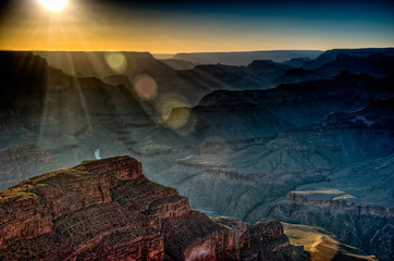 Grand Canyon Sunset with sun rays and lens flare effect