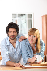 Fototapeta premium Portrait d'un couple dans la cuisine