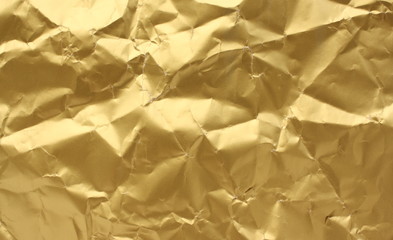 Gold Paper folded and creased for a textured background
