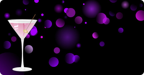 Martini on dark defocused illuminated background