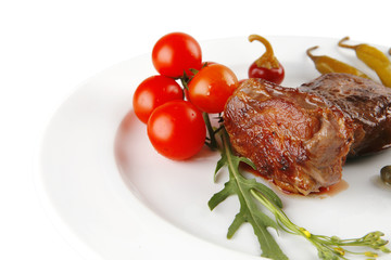 roast meat medallion with cherry tomatoes