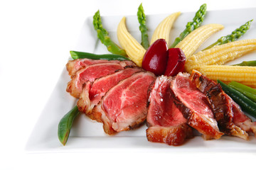 roast meat served with corns