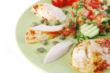 grilled meat drumstick served green