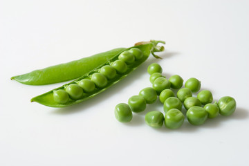 Green peas on white