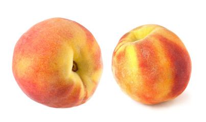 Fototapeta na wymiar Two full peaches isolated on white background
