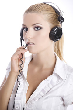 Beautiful business woman wearing a headset