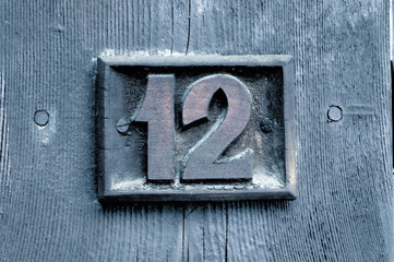 number '12' woodcarving