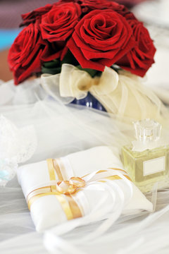 perfume  and wedding rings