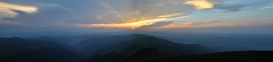 Sunset over blue mountains panorama
