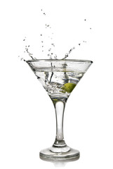martini with olive and splash isolated on white