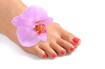 Beautiful feet leg with perfect spa pedicure on bright pink nail