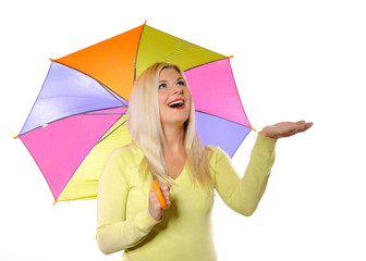 Portrait of pretty autumn woman standing under umbrella. white b