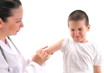 Doctor giving an injection in arm a mimmicking child.