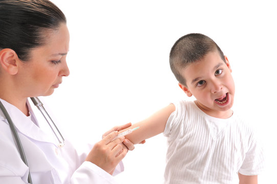 Doctor giving an injection in arm a mimmicking child.