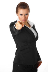 modern business woman pointing finger at you isolated on white