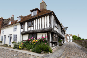 Tudor house with flower bed