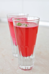 Red drinks in glasses