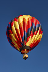 Naklejka premium Hot Air Balloon Rising to the Sky