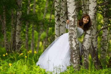 Obraz na płótnie Canvas The girl in a wedding dress