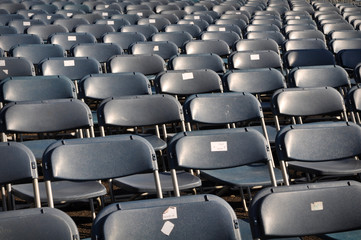 Black Chairs in Stadium for Concert