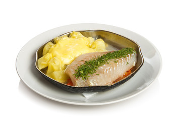 Milanese zander baked with potatoes and cheese