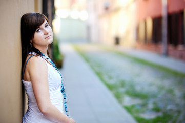 Young attractive woman in a city