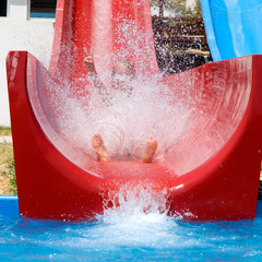 Litle Gril has a fun with water slide - 24670135