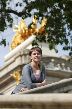 Woman poses on the monument background
