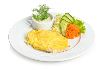 Chicken fillet in cheese with sauce and vegetable side dish.
