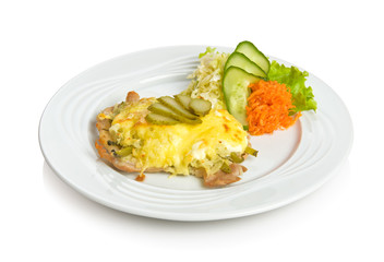 Pork fillet baked with pickled cucumber, potato and sour cream.