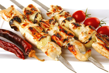 roasted chicken kebab on white