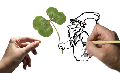 A hand inking a leprechaun cartoon who is offering a clover