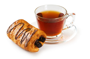 Breakfast concept - croissant and tea isolated on white