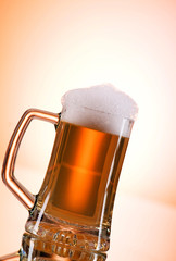 Beer glasses against the colorful gradient background