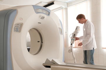 Doctor with CT scan films