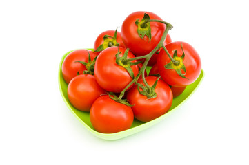 Red tomatoes isolated on the white background