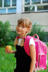 Fototapeta premium young girl going to school