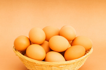 Basket of eggs on the colourful background