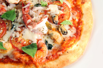 pizza seafood with basil leaf