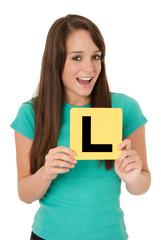 Girl holding yellow Australian L plate
