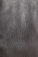 Photo sur Aluminium Cuir Gros plan vertical de la texture du cuir marron sans couture