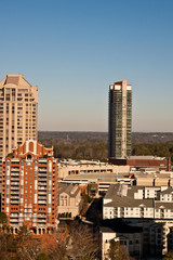 Three Condo Towers around Shopping Center