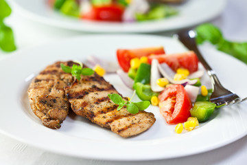 Grilled chicken with vegetable salad