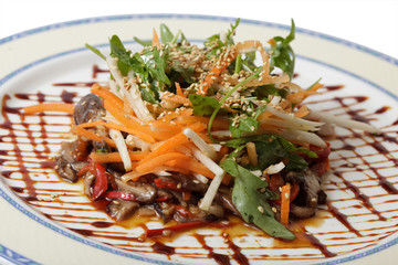 vegetable salad on a plate. isolated on a white background