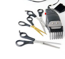 barber electric clippers with scissors, on white