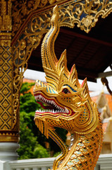 Fototapeta premium Dragon detail on the Wat Phra Singh temple, Thailand