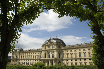 Fototapeta premium German Castle with blue sky and trees in the foreground