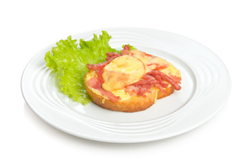 Hot sandwich with cheese, sausages, ham and lettuce