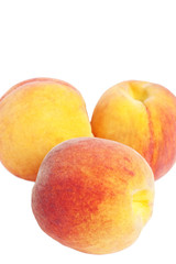 vertical closeup of peaches with selective focus